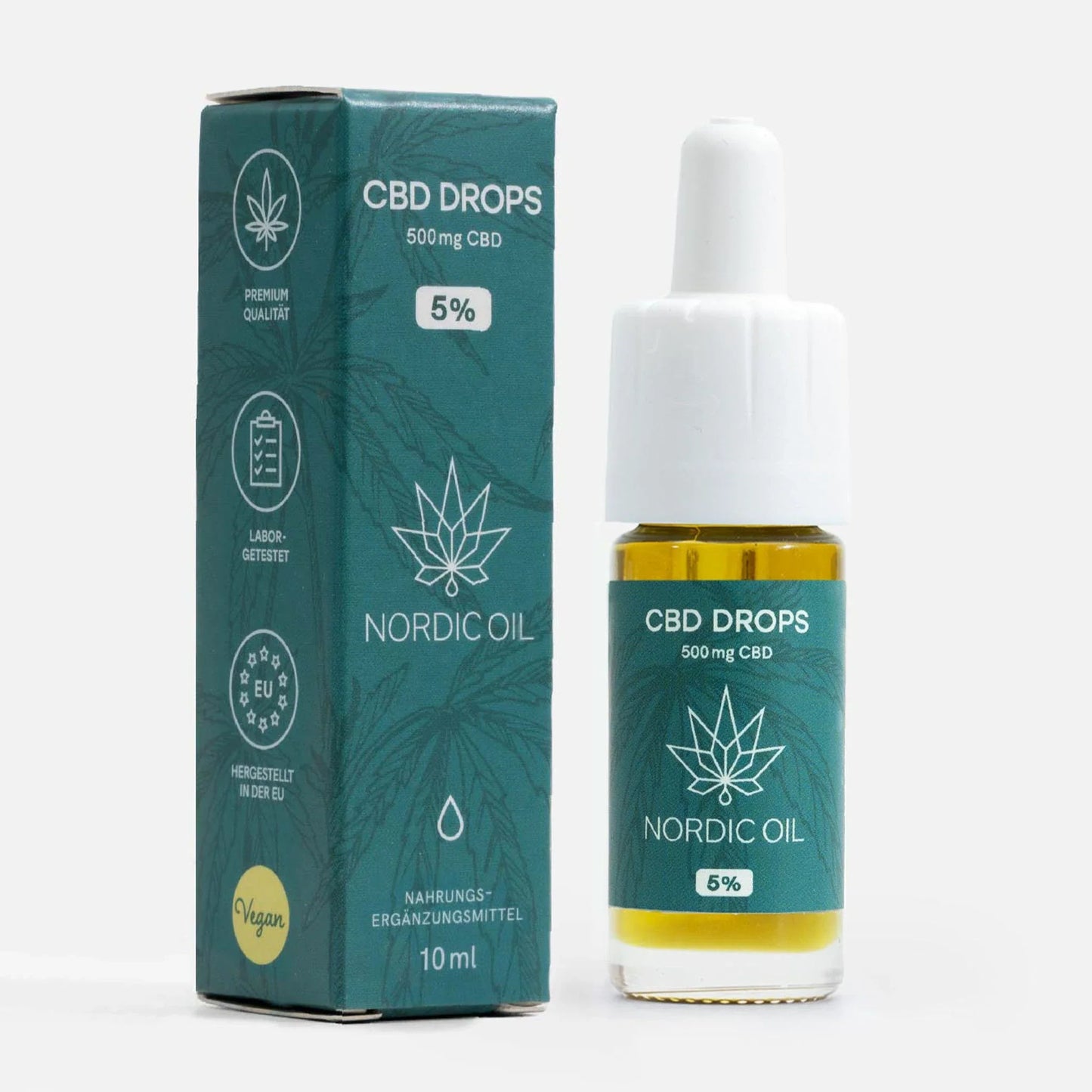 Eine Flasche CBD Öl 5% von Nordic Oil neben der Verpackung