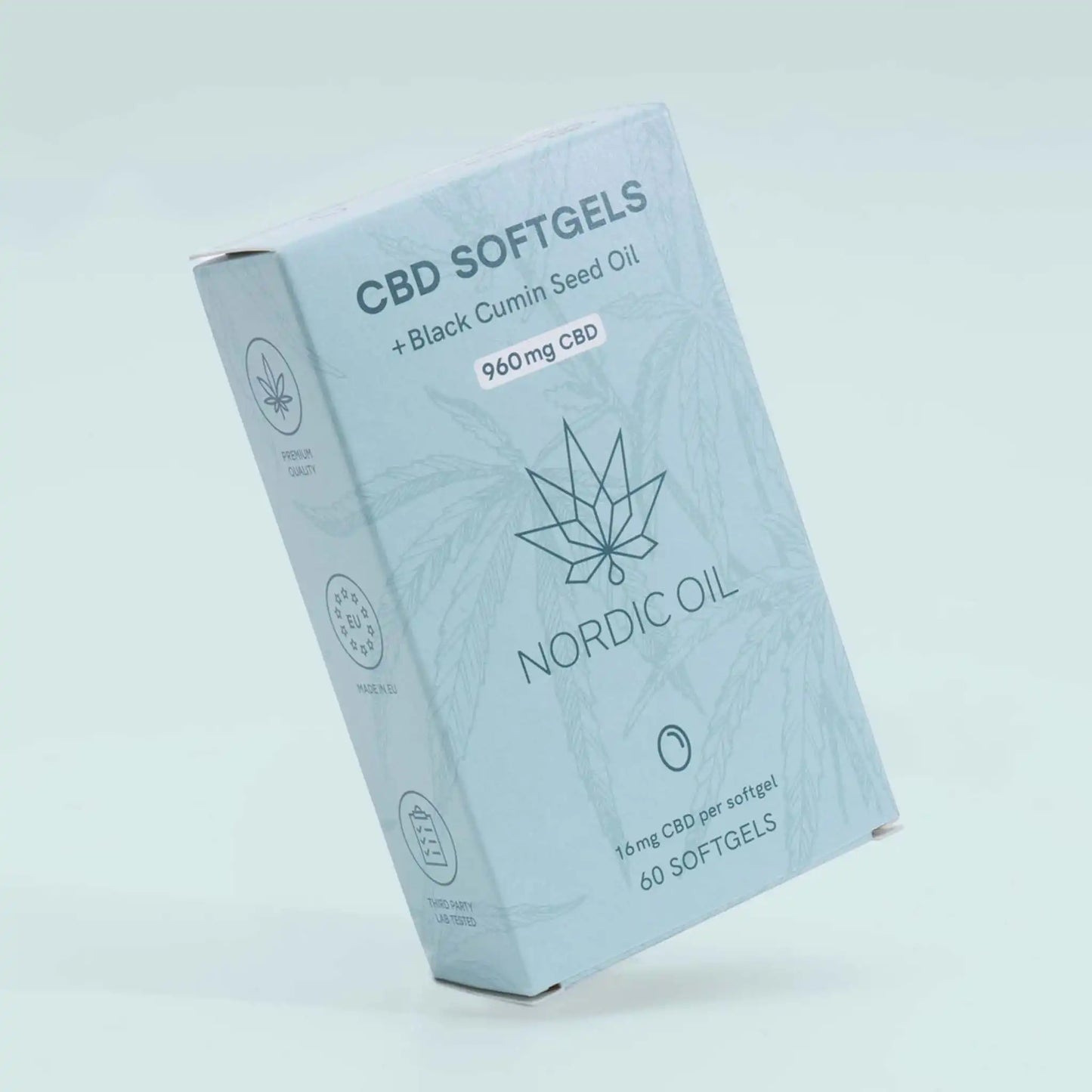 CBD Kapsel Packung steht schräg auf Blauem Hintergrund