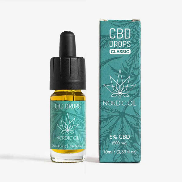 Eine Flasche CBD Öl 5% Classic neben der Verpackung