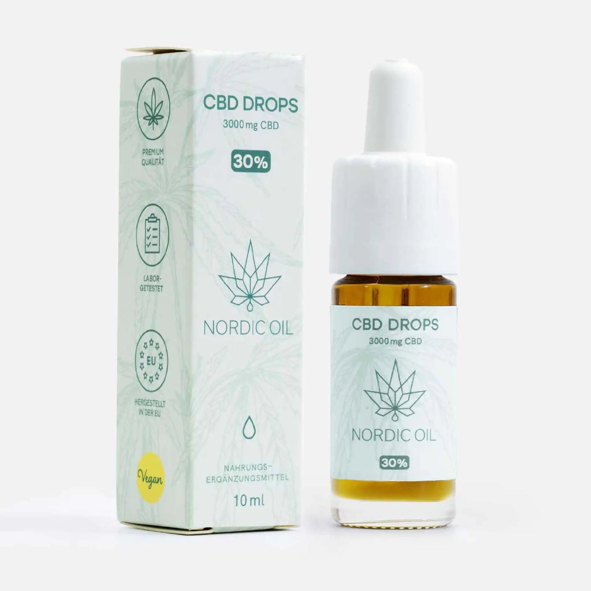 Eine Flasche CBD Öl 30% von Nordic Oil neben der Verpackung