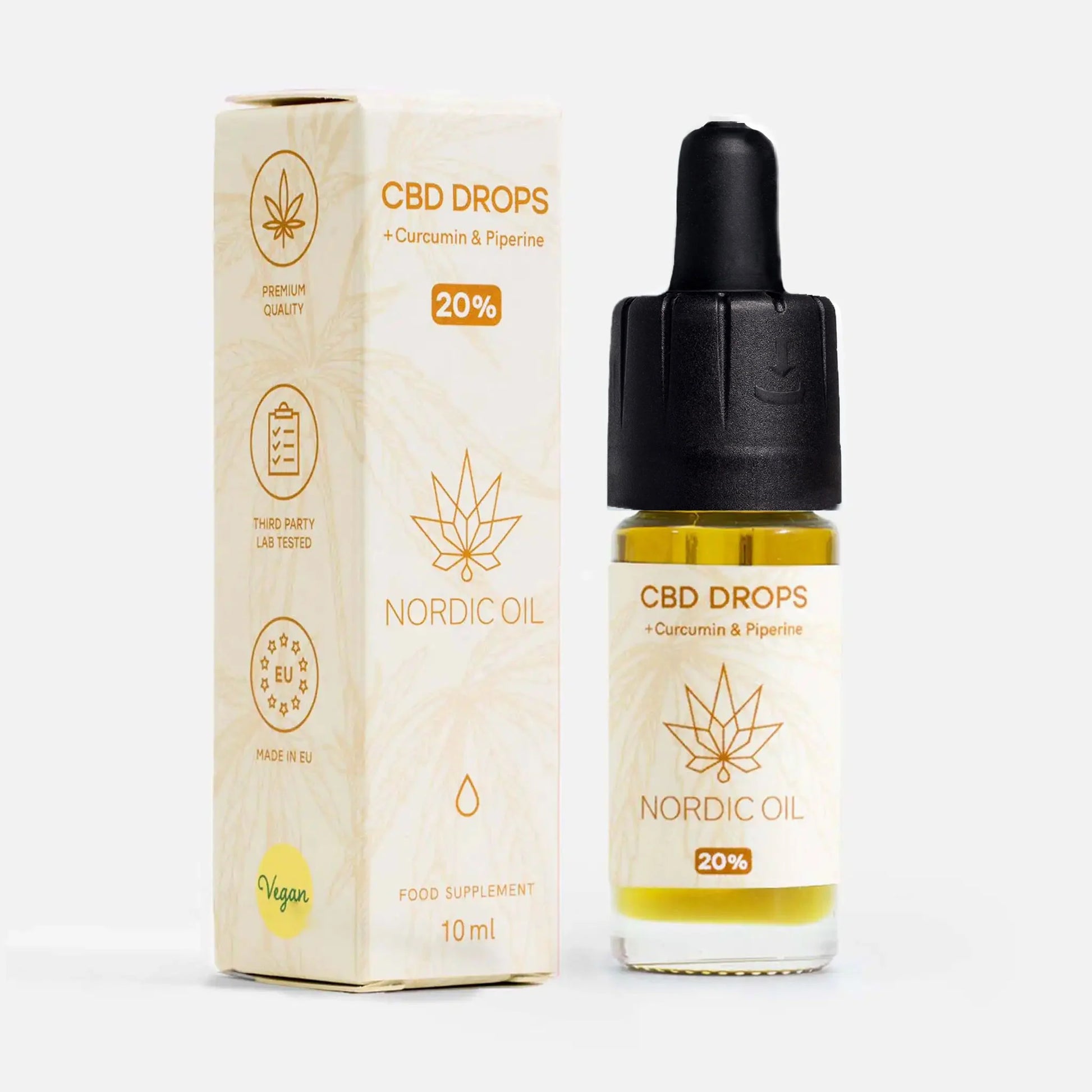 CBD Öl mit Kurkumin (20%) neben der Verpackung