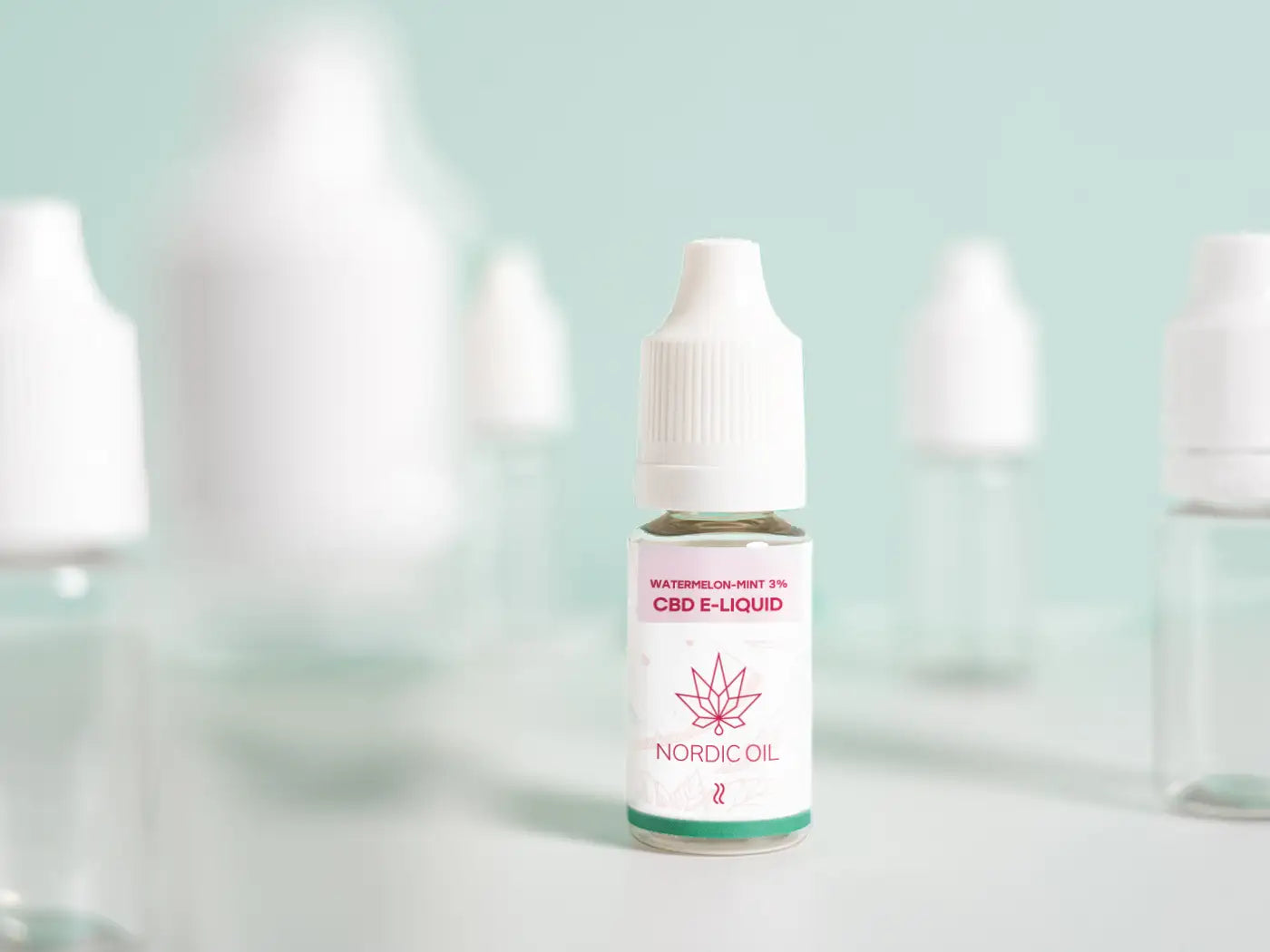 CBD E-Liquid mit Wassermelonengeschmack von Nordic Oil und anderen Flaschen